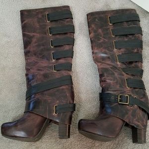 Jessica Simpson tall boots with heel.